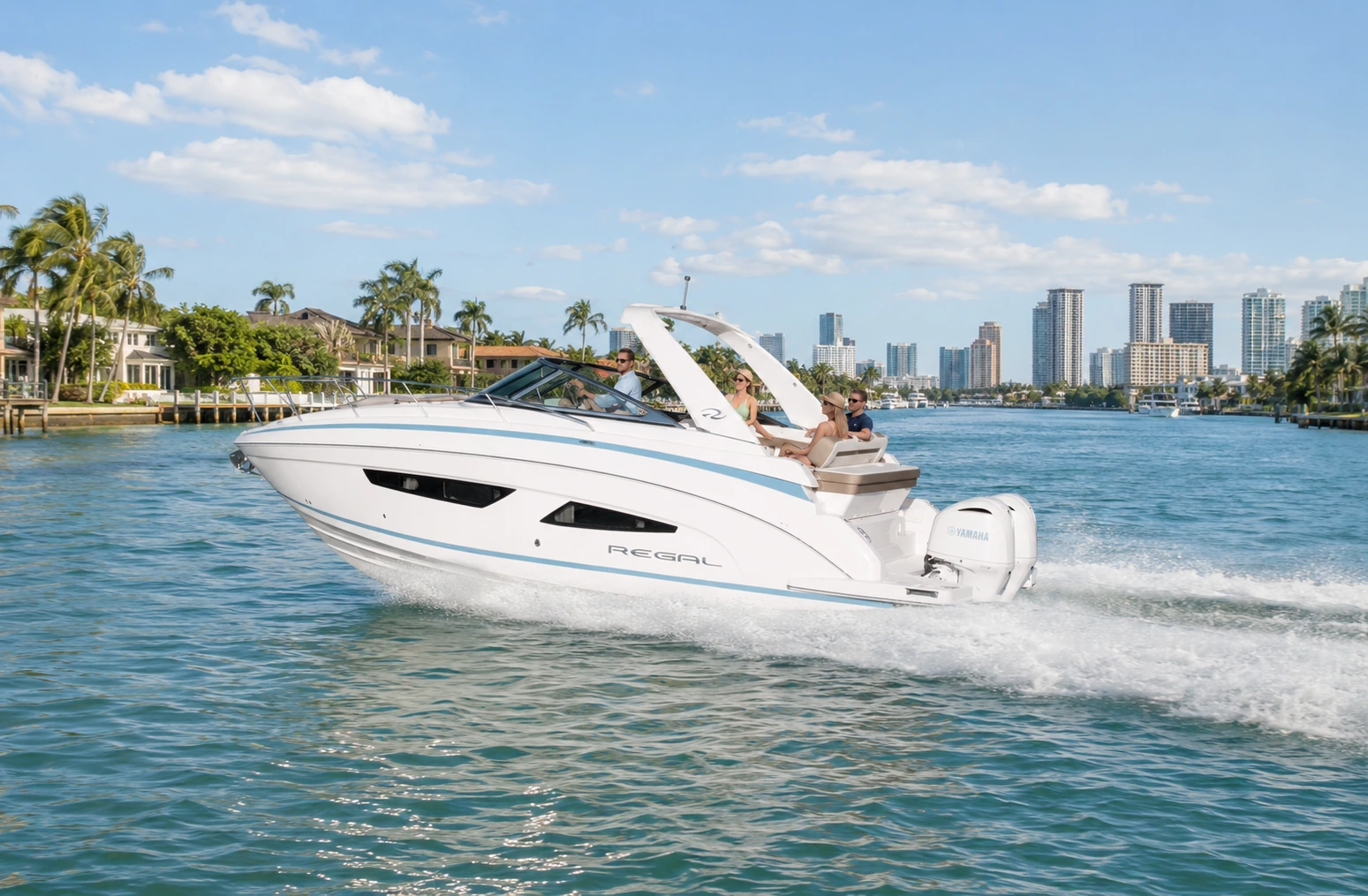 Regal 33 OBX cruising Fort Lauderdale at golden hour